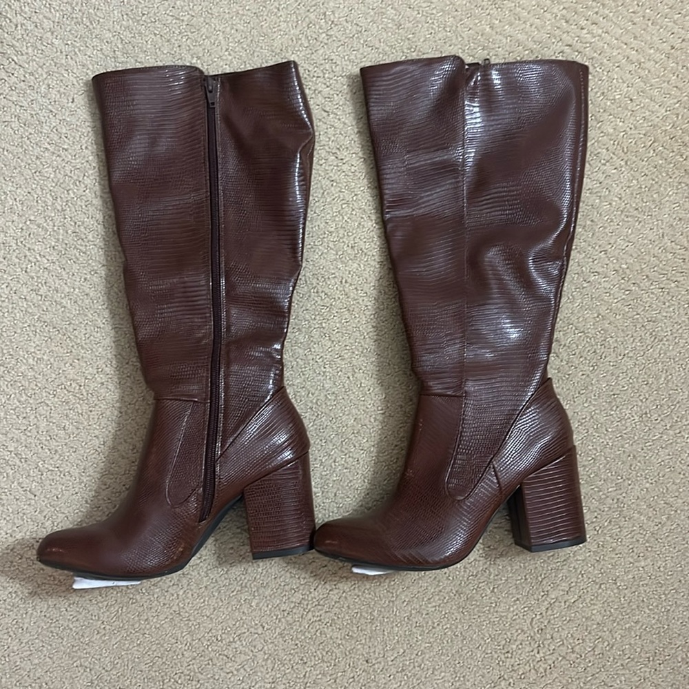 Never worn before knee high boots.